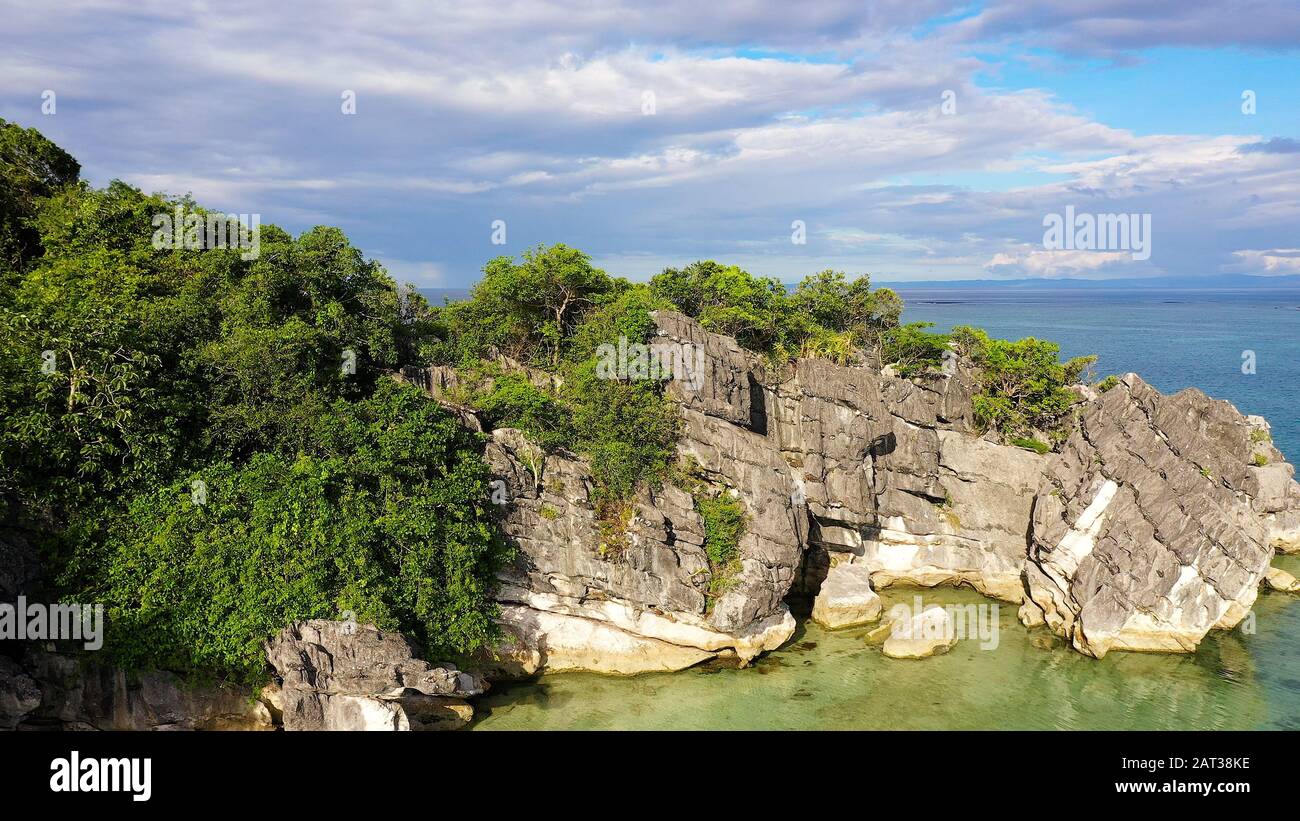 Nature landscape: Sandy tropical beach with crystal clear sea. Rocks and tropical beach in Caramoan island, Philippines, Asia. Summer and travel vacation concept. Sabitang Laya Stock Photo