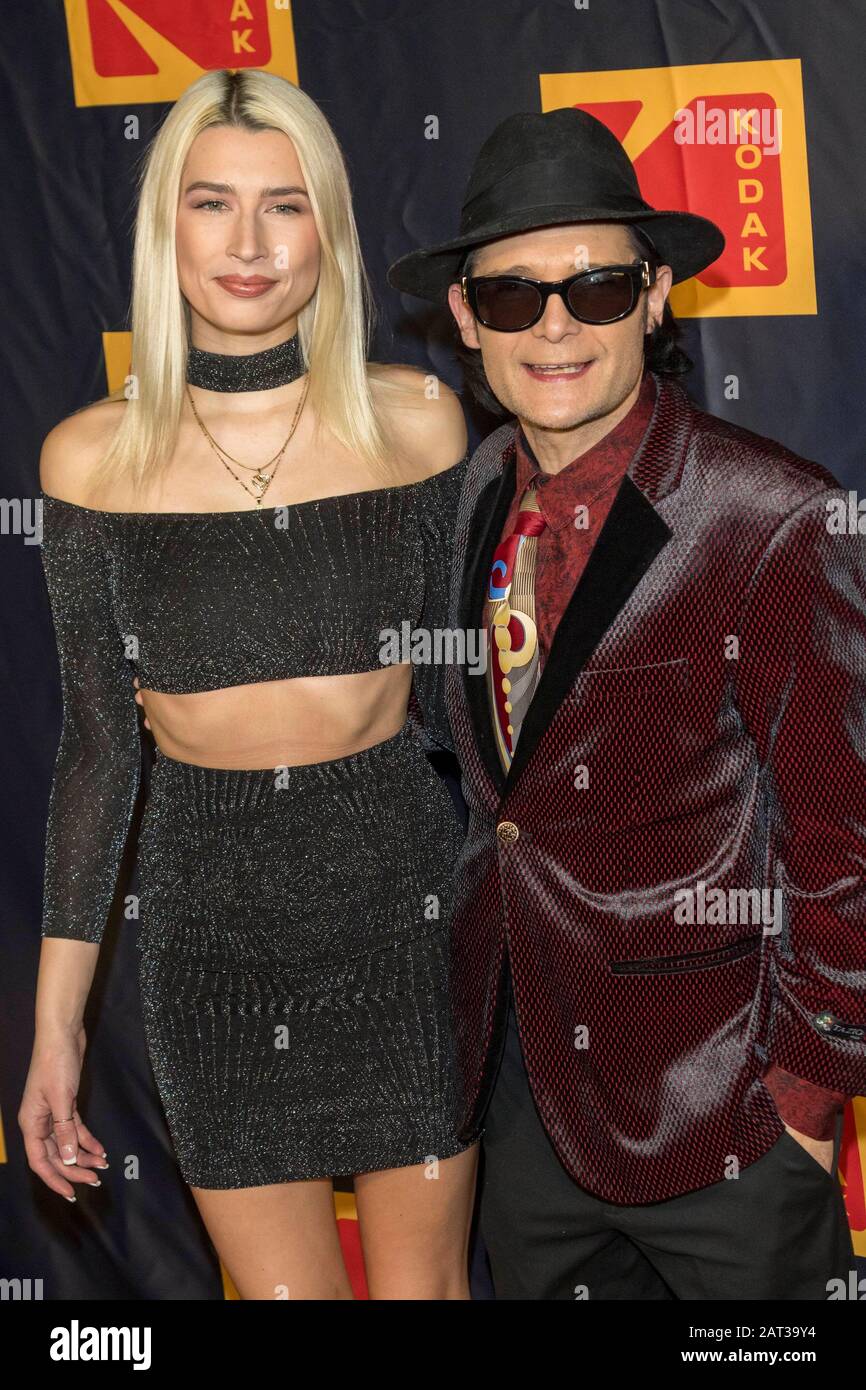 Courtney Anne Mitchell and Corey Feldman (r) attend the 4th Annual