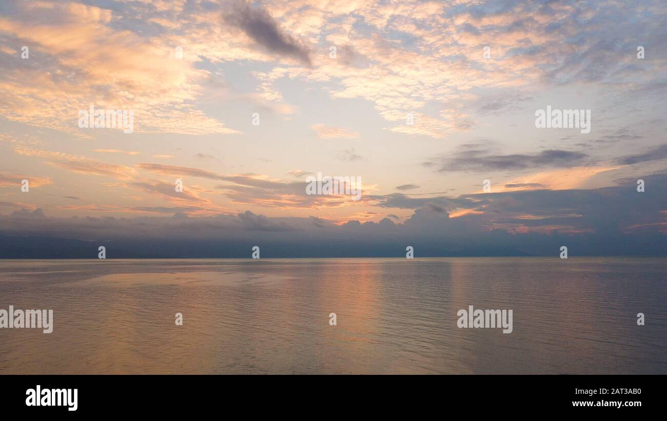 Sunrise over the sea, view from the drone. Early morning seascape. Sogod Bay, Philippines. Summer and travel vacation concept. Stock Photo