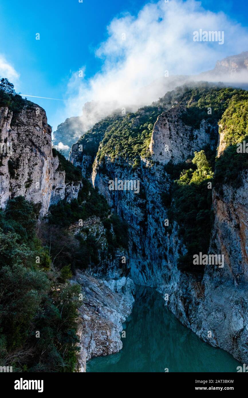 The foggy landscape of the canyon of Gongost de Mont-rebei (Spain) Stock Photo