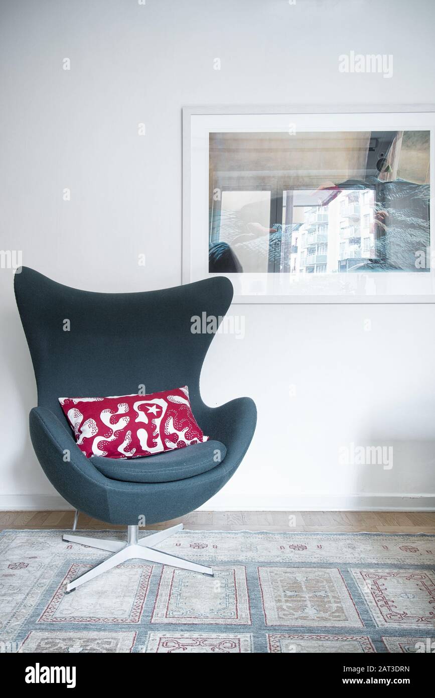 hanging egg chair in living room in 2 1 2 men show on Arne Jacobsen Egg Chair High Resolution Stock Photography And Images Alamy