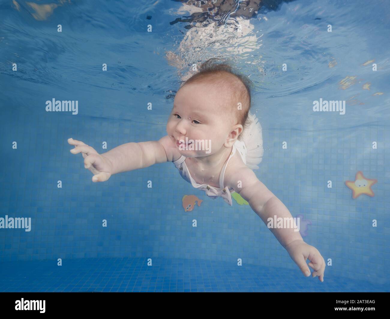Odessa, Ukraine, Eastern Europe. 8th Aug, 2018. Little baby girl learns