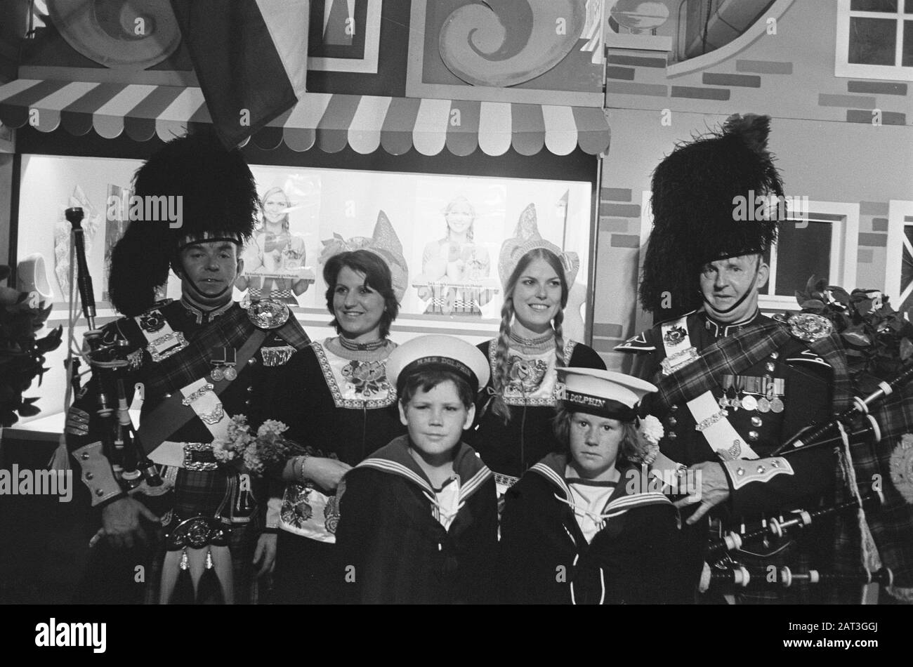 Marine Chapel at the Royal Tournament at the Earls Court Exhibition Building  Dutch cheese girls with Scottish bagpipes and children in sailor suit Date: 17 July 1975 Location: Great Britain, London Keywords: children, costume, military, uniforms Institution name: Marine Chapel of the Royal Navy Stock Photo