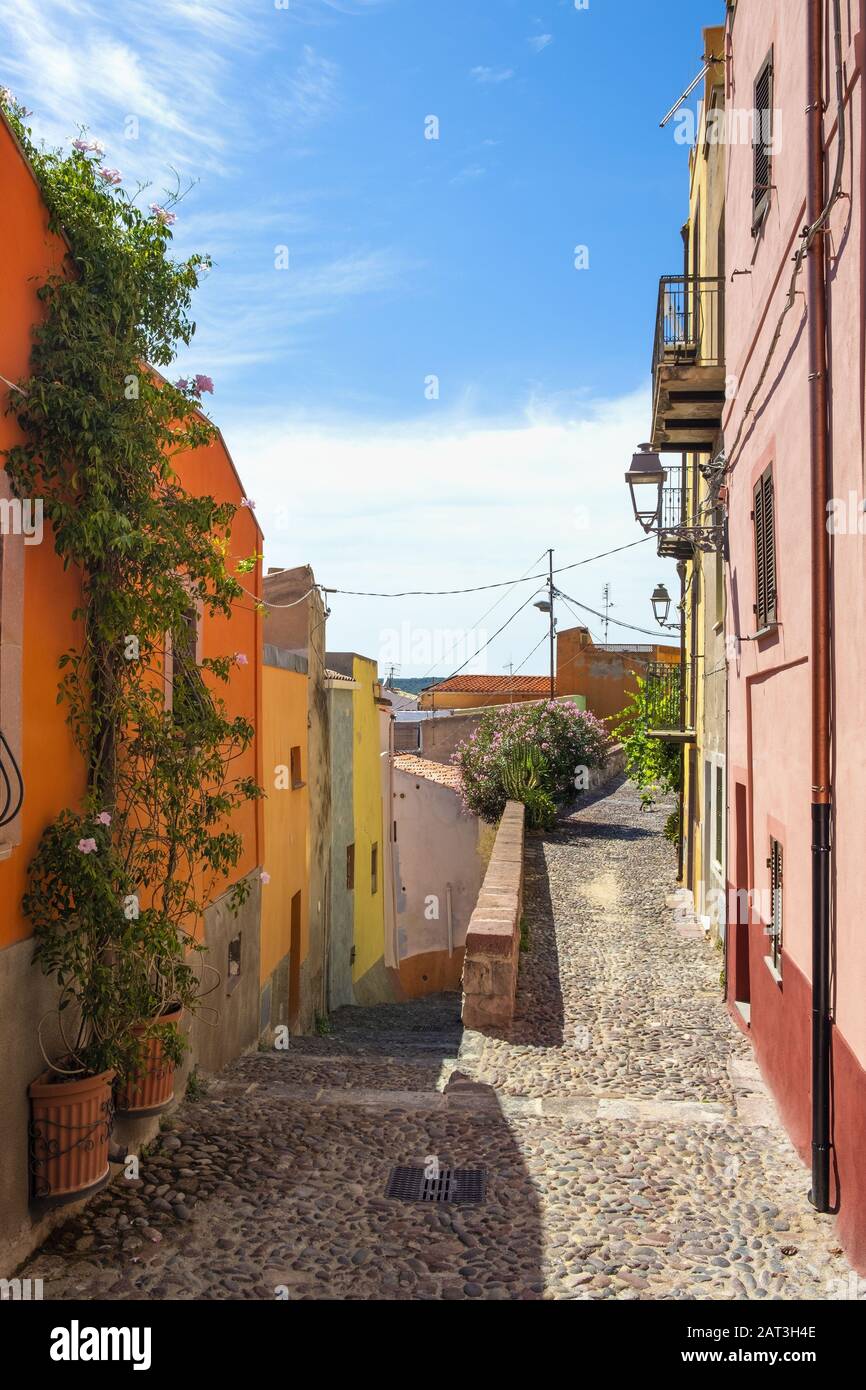 Bosa, Sardinia / Italy - 2018/08/13: Summer view of the Bosa old town quarter with historic colorful tenements and streets Stock Photo