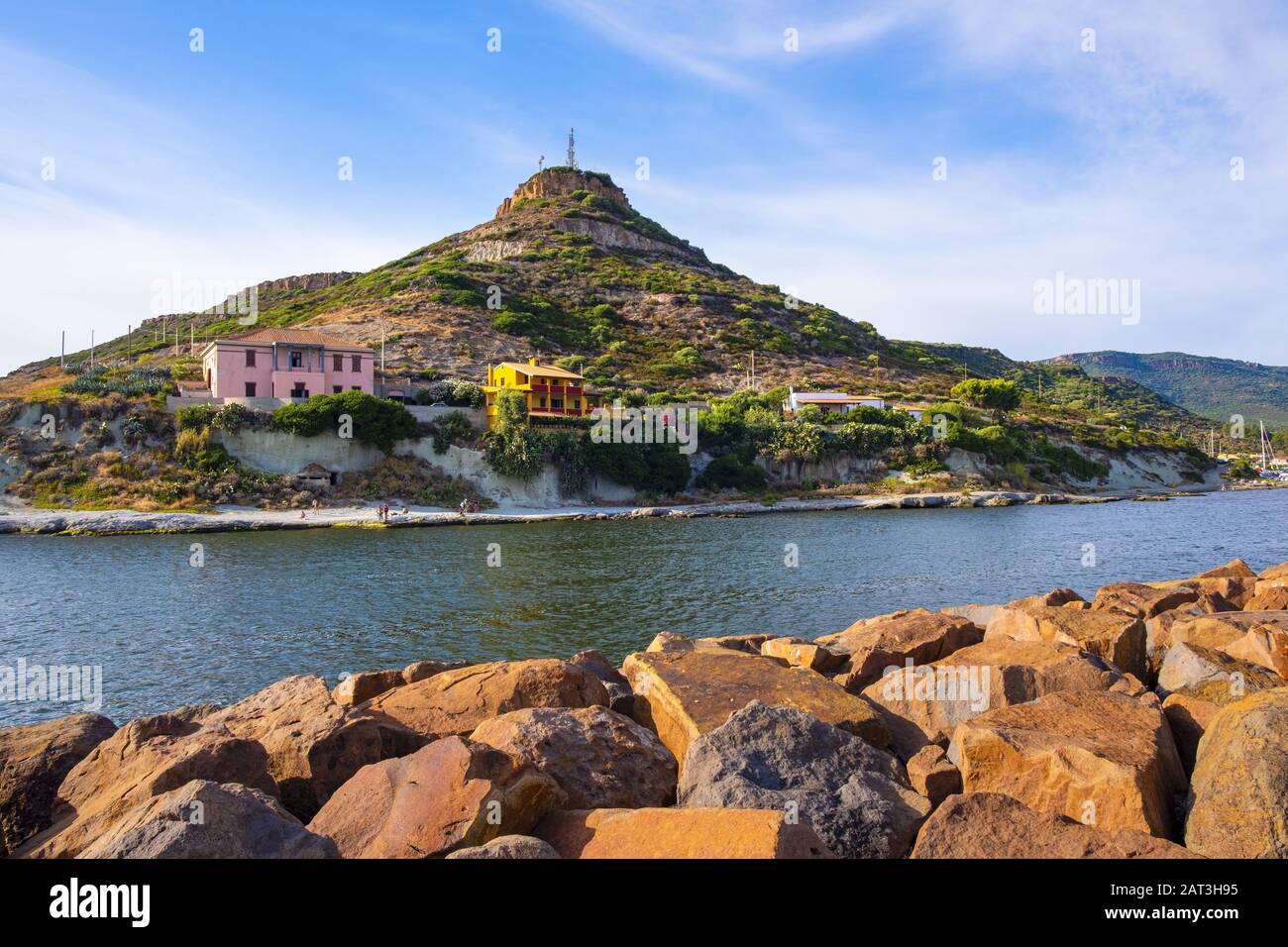 Bosa Marina, Sardinia / Italy - 2018/08/13: Panoramic view of the hill with television broadcasting towers and antennas over the town of Bosa Marina by the Temo river embankment Stock Photo