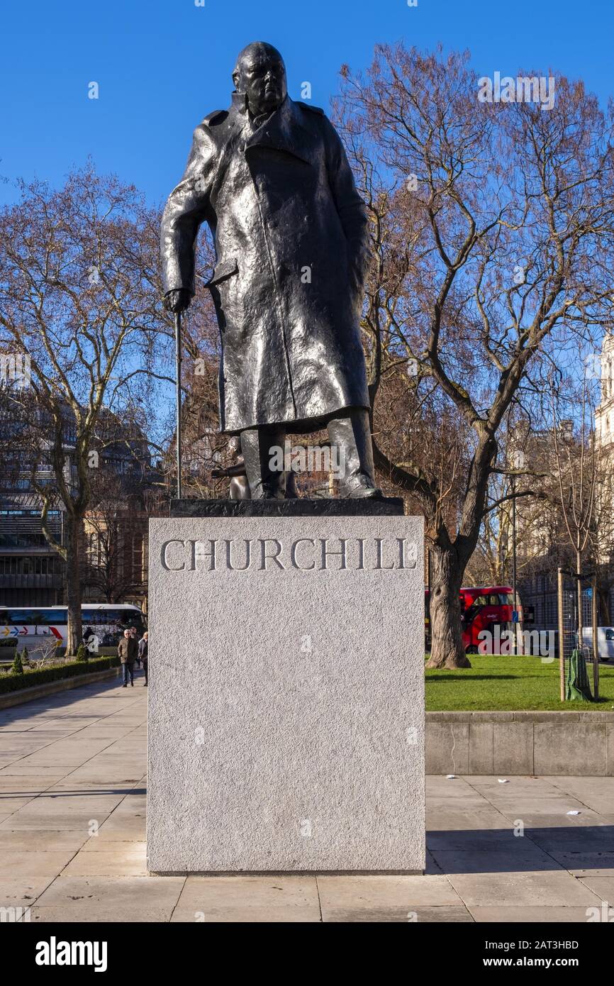 London, England / United Kingdom - 2019/01/28: Sir Winston Churchill statue by Ivor Roberts-Jones at the Parliament Square in the City of Westminster quarter of Central London Stock Photo