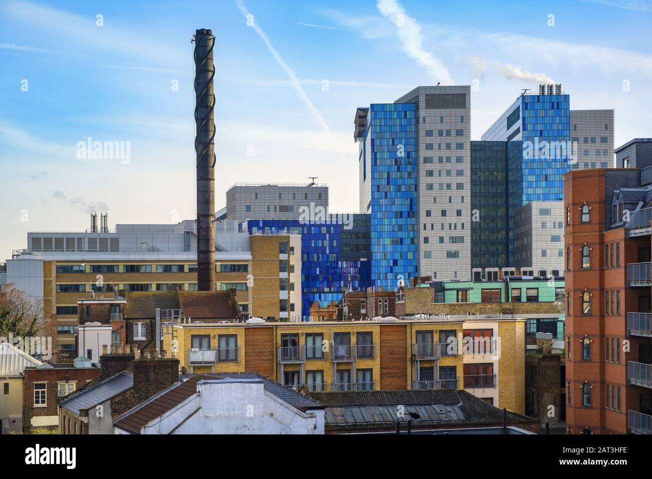 London, England / United Kingdom - 2019/01/29: Panoramic view of the Whitechapel district of East London with fusion of traditional and modernistic architecture neighboring Whitechapel street Stock Photo