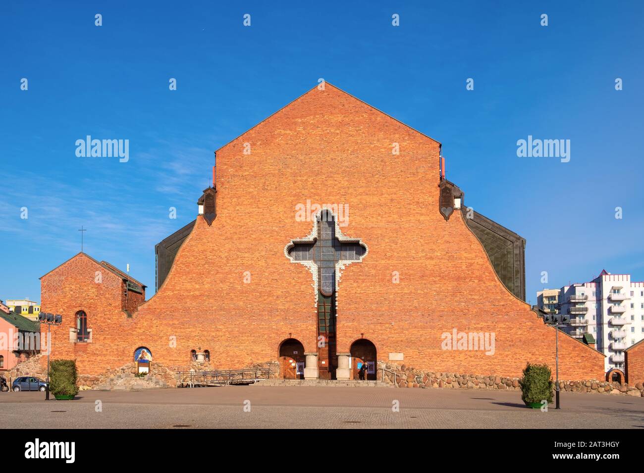 Warsaw, Mazovia / Poland - 2019/02/23: Brick modernistic facade of the Holy Ascension church in Stoklosy district of Warsaw, in Ursynow part of the city. Stock Photo