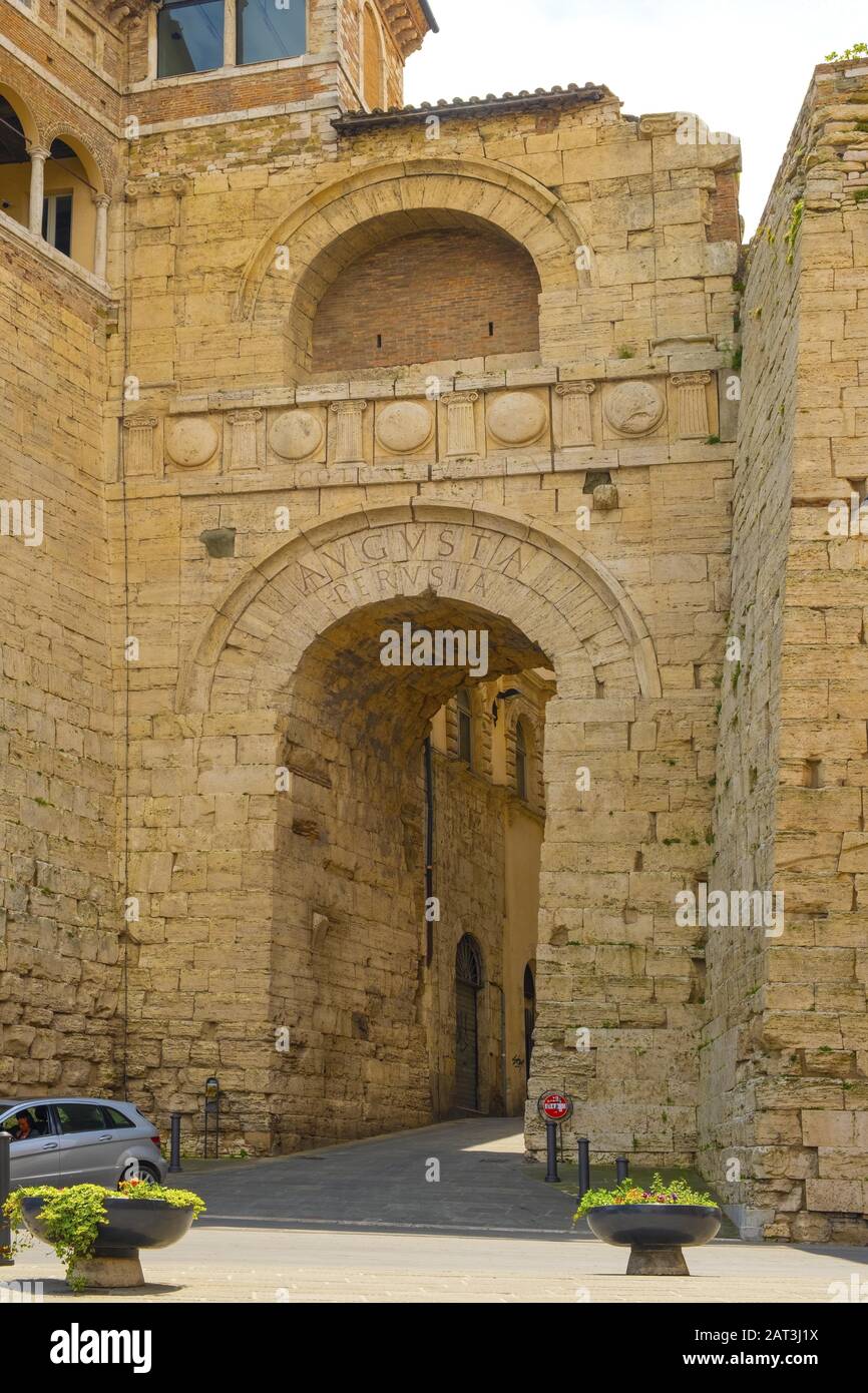 Perugia, Umbria / Italy - 2018/05/28: Arco Etrusco o di Augusto Etruscan Arch being an entrance to the ancient Etruscan Acropolis in Perugia historic quarter Stock Photo