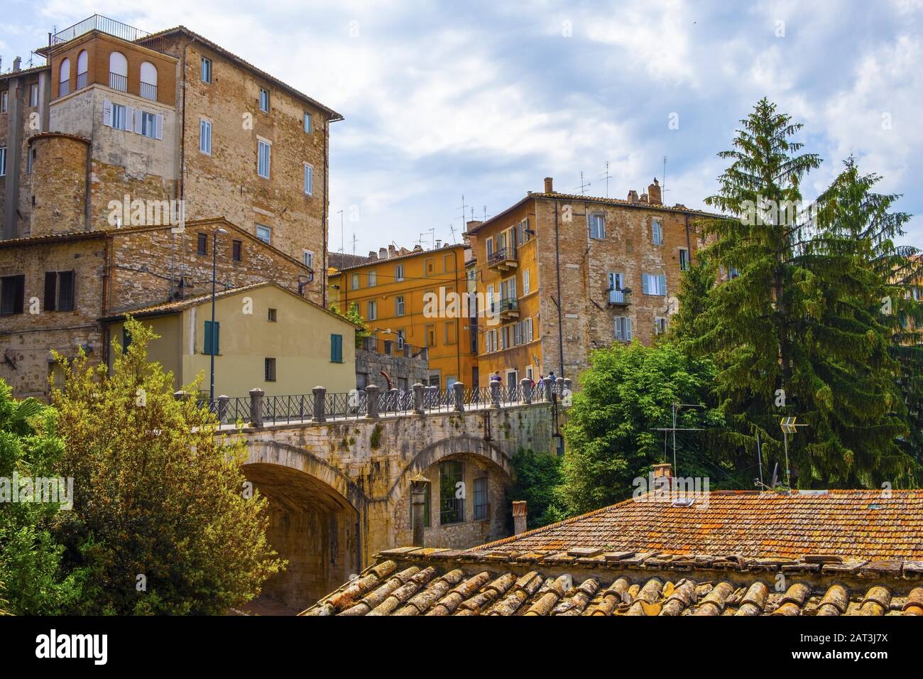 Perugia, Umbria / Italy - 2018/05/28: Panoramic view of the historic aqueduct forming Via dell Acquedotto pedestrian street along the ancient Via Appia street in Perugia historic quarter Stock Photo