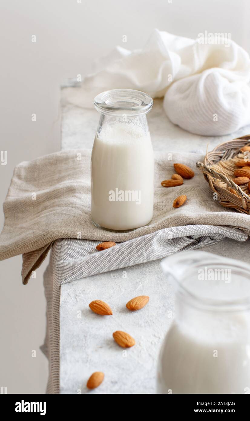 Vegan almond milk, non dairy alternative milk in a bottle close up