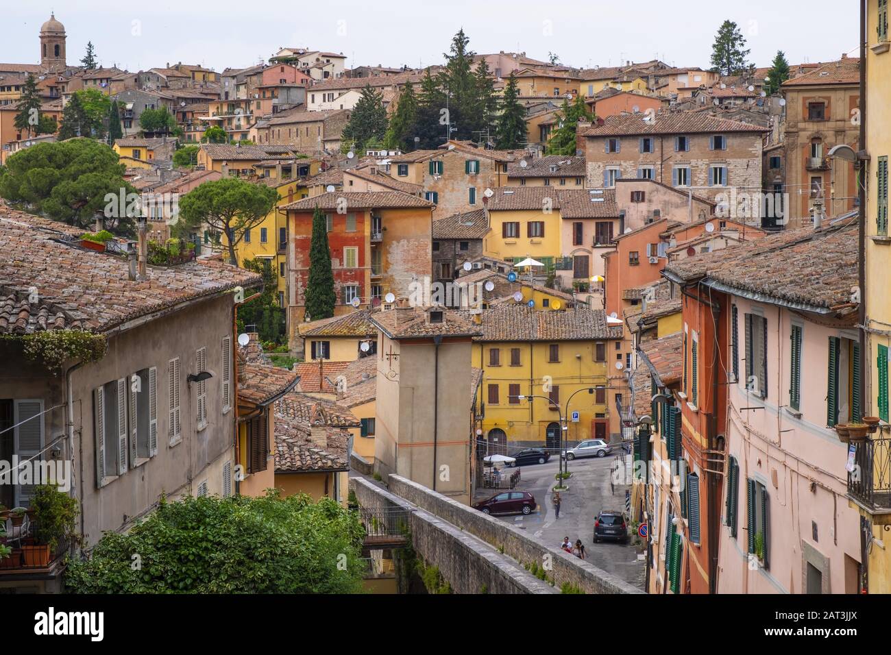 Perugia, Umbria / Italy - 2018/05/28: Panoramic view of the historic aqueduct forming Via dell Acquedotto pedestrian street along the ancient Via Appia street in Perugia historic quarter Stock Photo