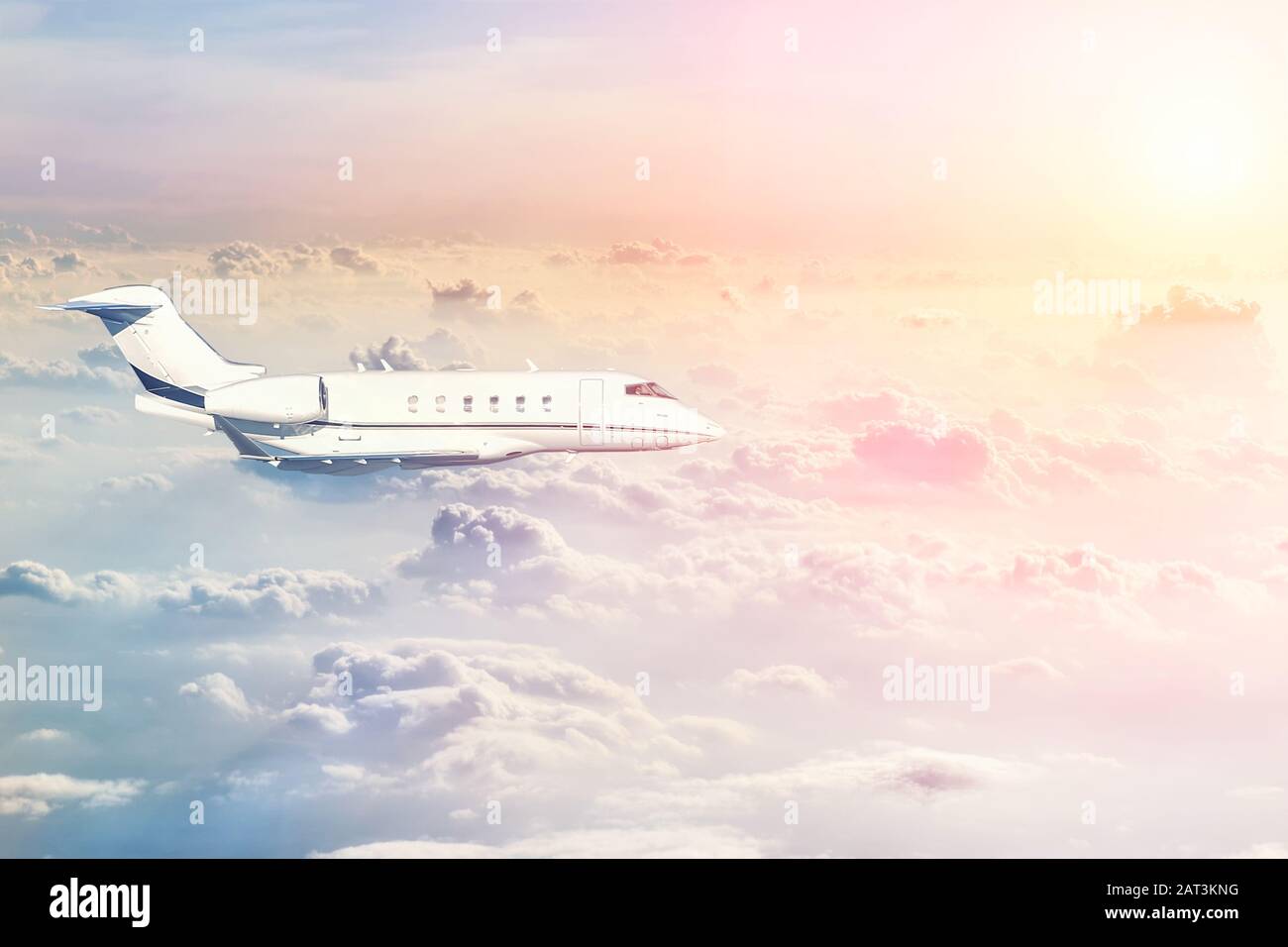 Mid Size Modern Vip Private Jet Flying High In Sky Over Evening Fluffy  Curly Clouds At Warm Colorful Sunset Time. Luxury Small Corporate Business  Stock Photo - Alamy