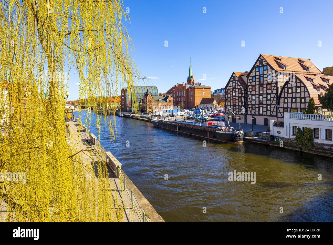 Bydgoszcz, Kujavian-Pomeranian / Poland - 2019/04/01: Panoramic view of the historic city center with the old town tenements along the Brda River embankment Stock Photo