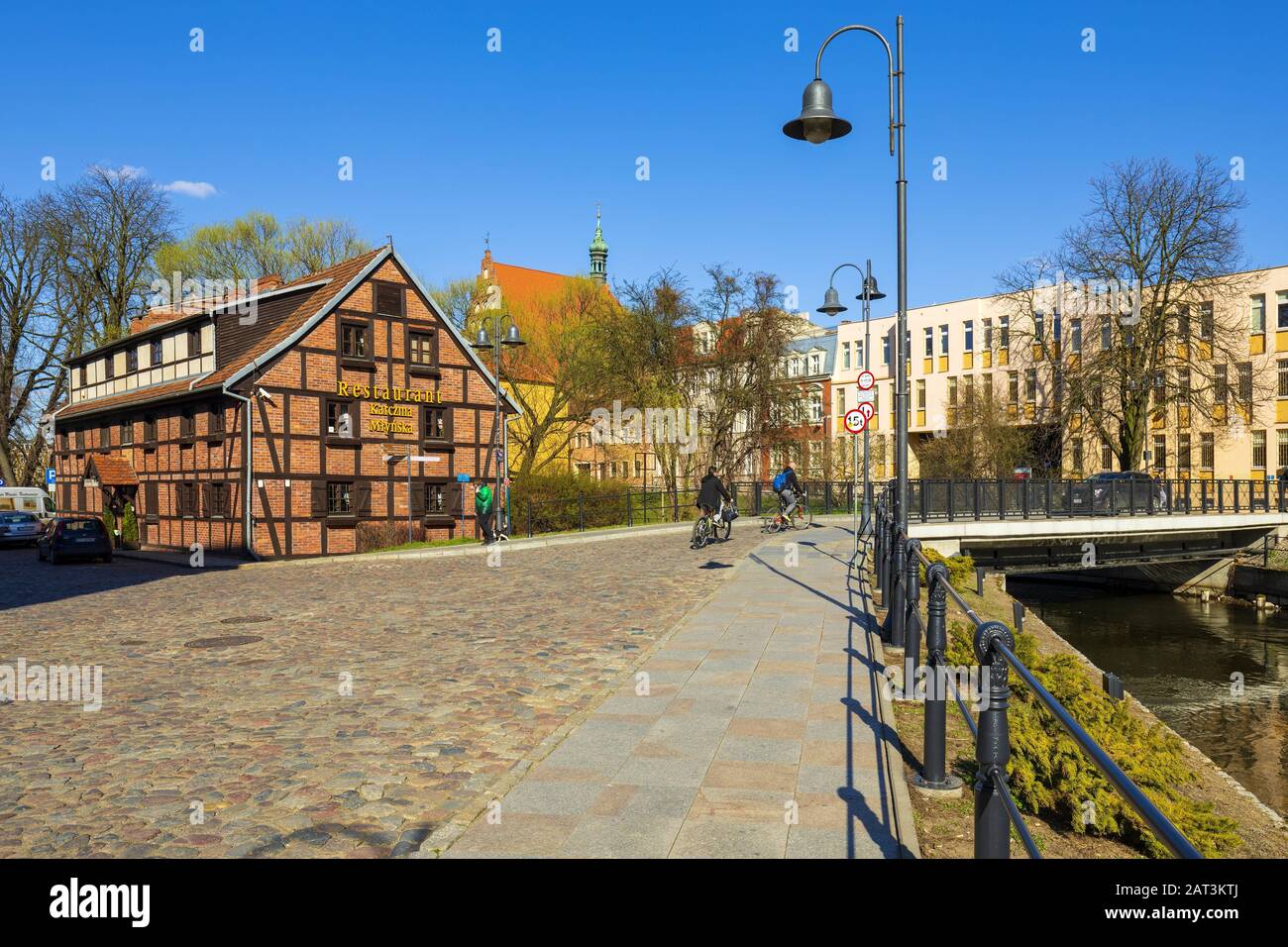 Bydgoszcz, Kujavian-Pomeranian / Poland - 2019/04/01: Panoramic view of the historic city center on the Mill Island with the old town tenements along the Brda River embankment Stock Photo