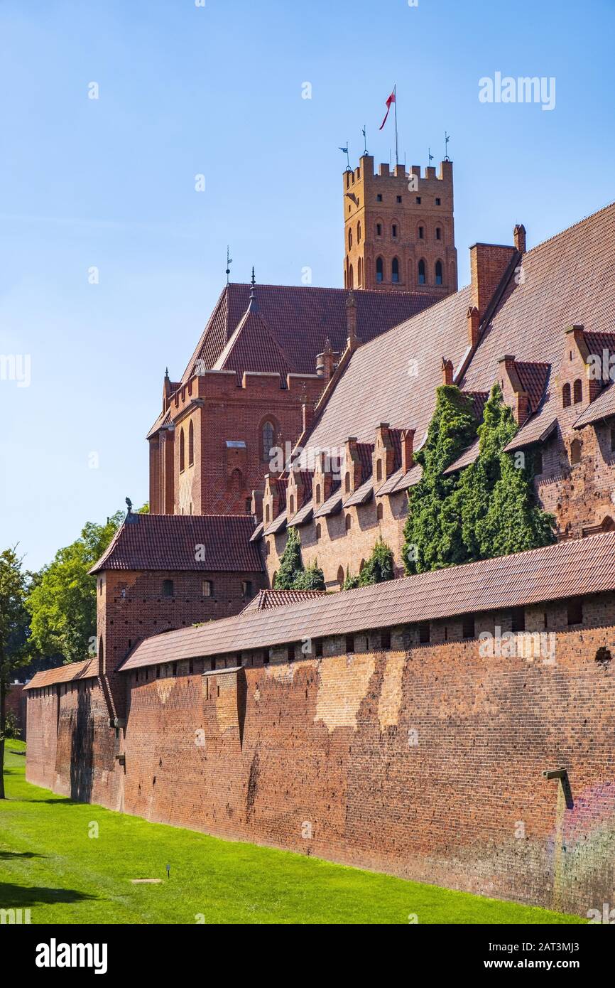 Malbork, Pomerania / Poland - 2019/08/24: Panoramic view of the medieval Teutonic Order Castle in Malbork, Poland - High Castle and Middle Castle surrounded with the inner defense walls Stock Photo