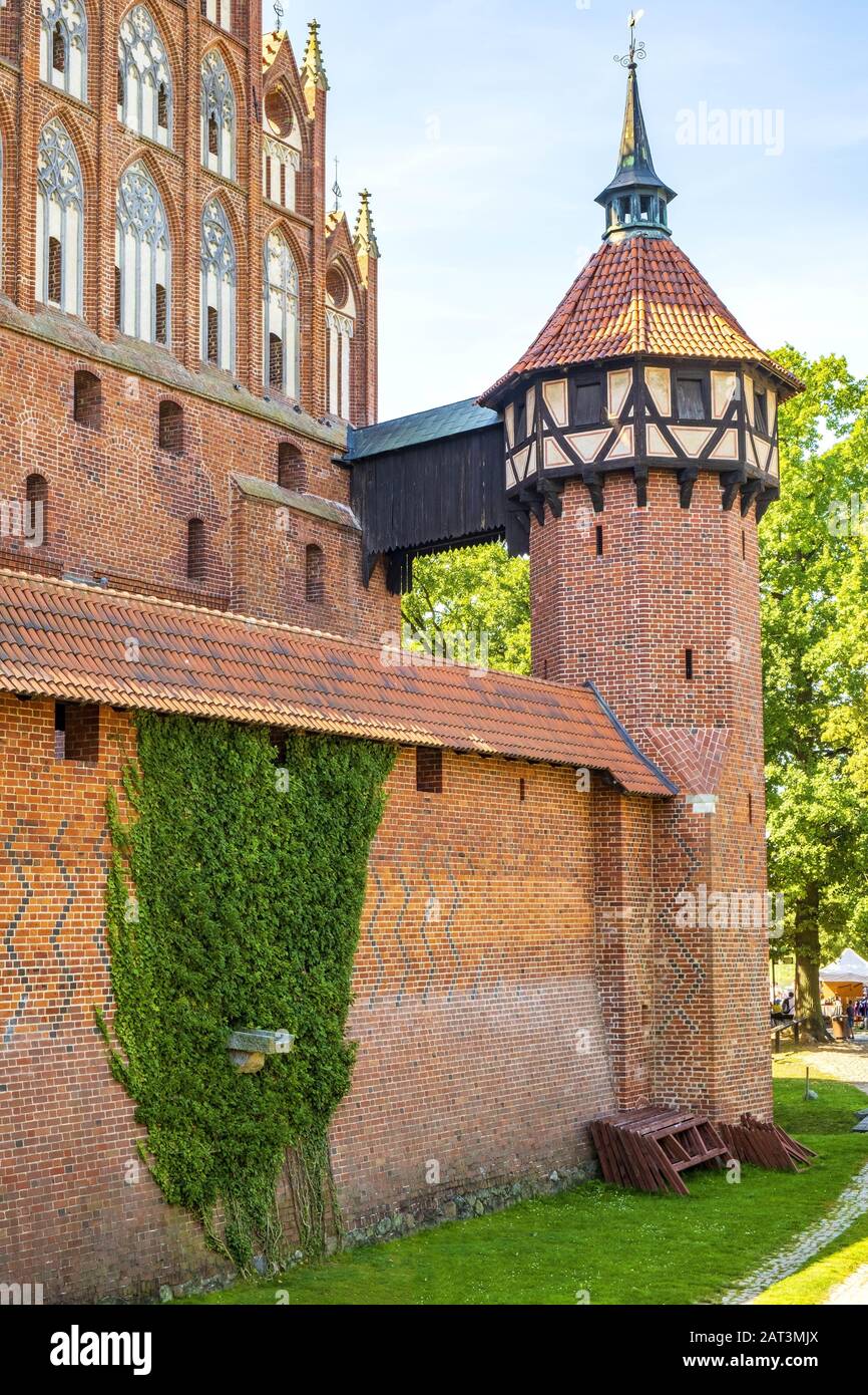 Malbork, Pomerania / Poland - 2019/08/24: Medieval Teutonic Order Castle in Malbork, Poland - Middle Castle fortress surrounded with the inner defense walls and a moat Stock Photo