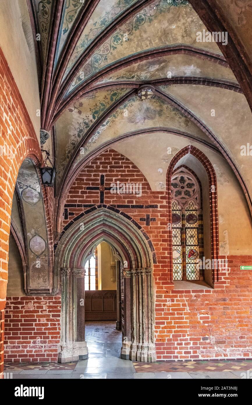 Malbork, Pomerania / Poland - 2019/08/24: Cloisters of the High Castle part of the Medieval Teutonic Order castle and monastery in Malbork, Poland Stock Photo