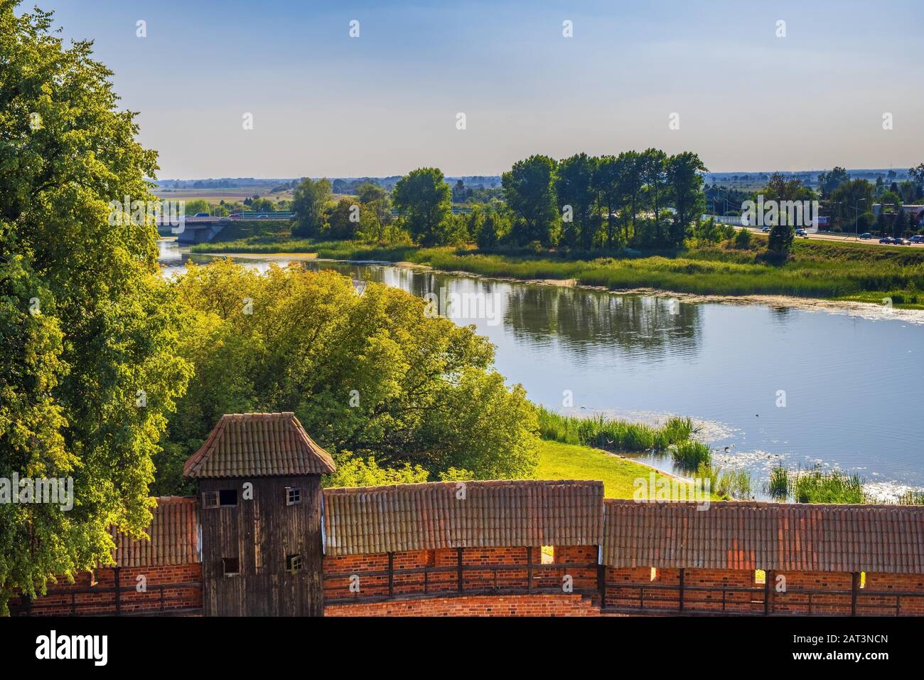 Malbork, Pomerania / Poland - 2019/08/24: Aerial panoramic view of the external defense walls Nogat river surrounding the medieval Teutonic Order Castle in Malbork, Poland Stock Photo