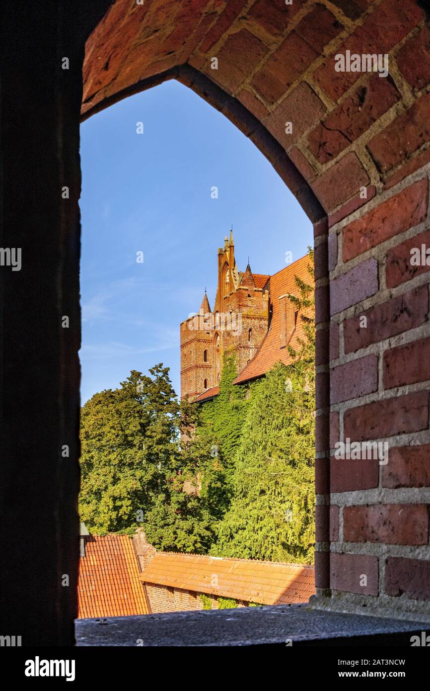 Malbork, Pomerania / Poland - 2019/08/24: Monumental gothic defence architecture of the High Castle part of the medieval Teutonic Order Castle in Malbork, Poland Stock Photo