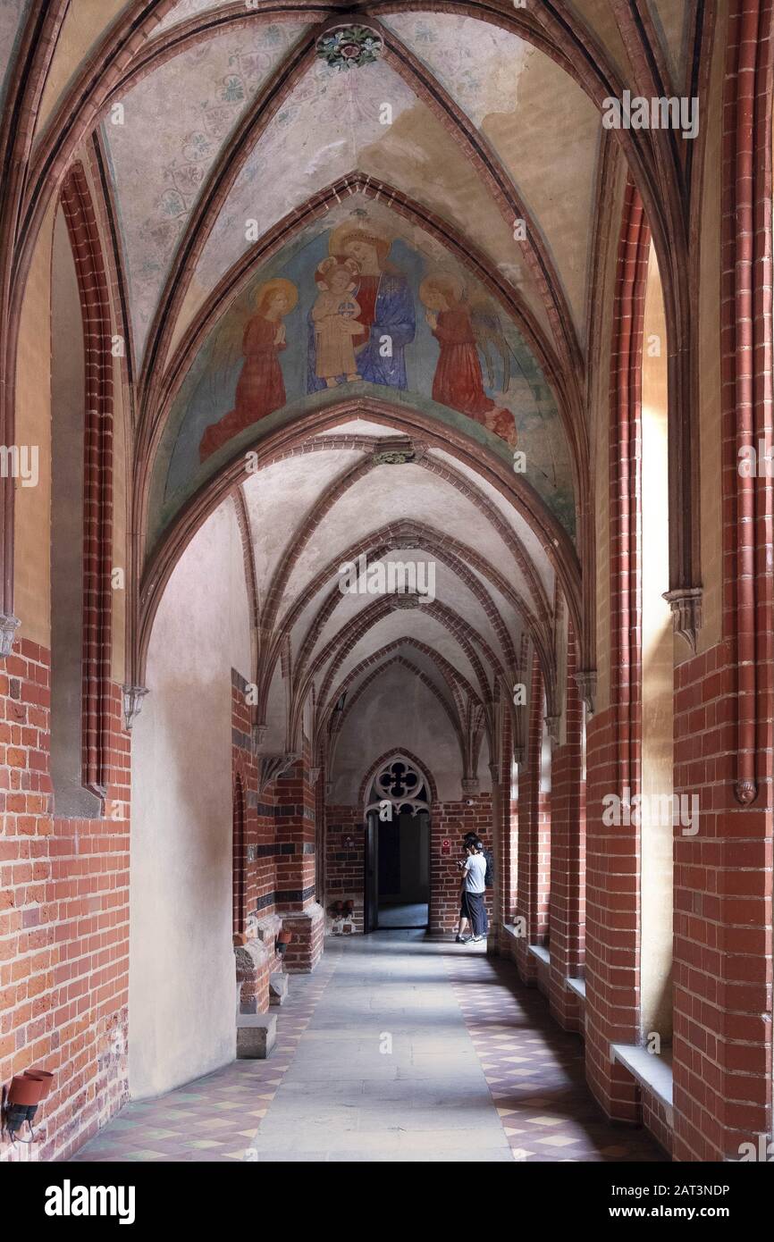 Malbork, Pomerania / Poland - 2019/08/24: Cloisters of the High Castle part of the Medieval Teutonic Order castle and monastery in Malbork, Poland Stock Photo