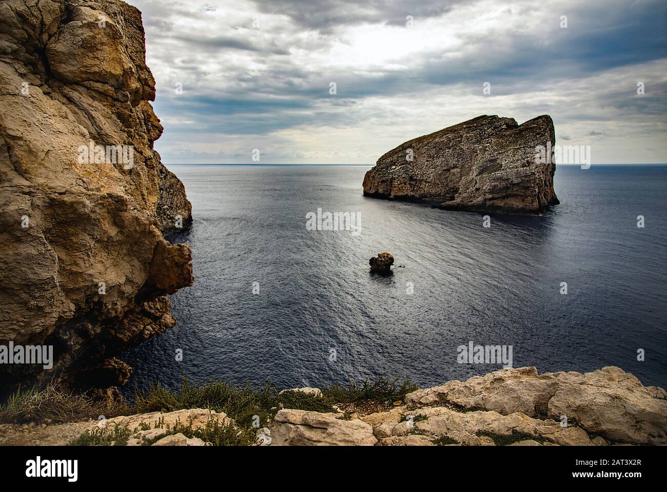 Island off Capo Caccia, north west Sardinia, Italy Stock Photo