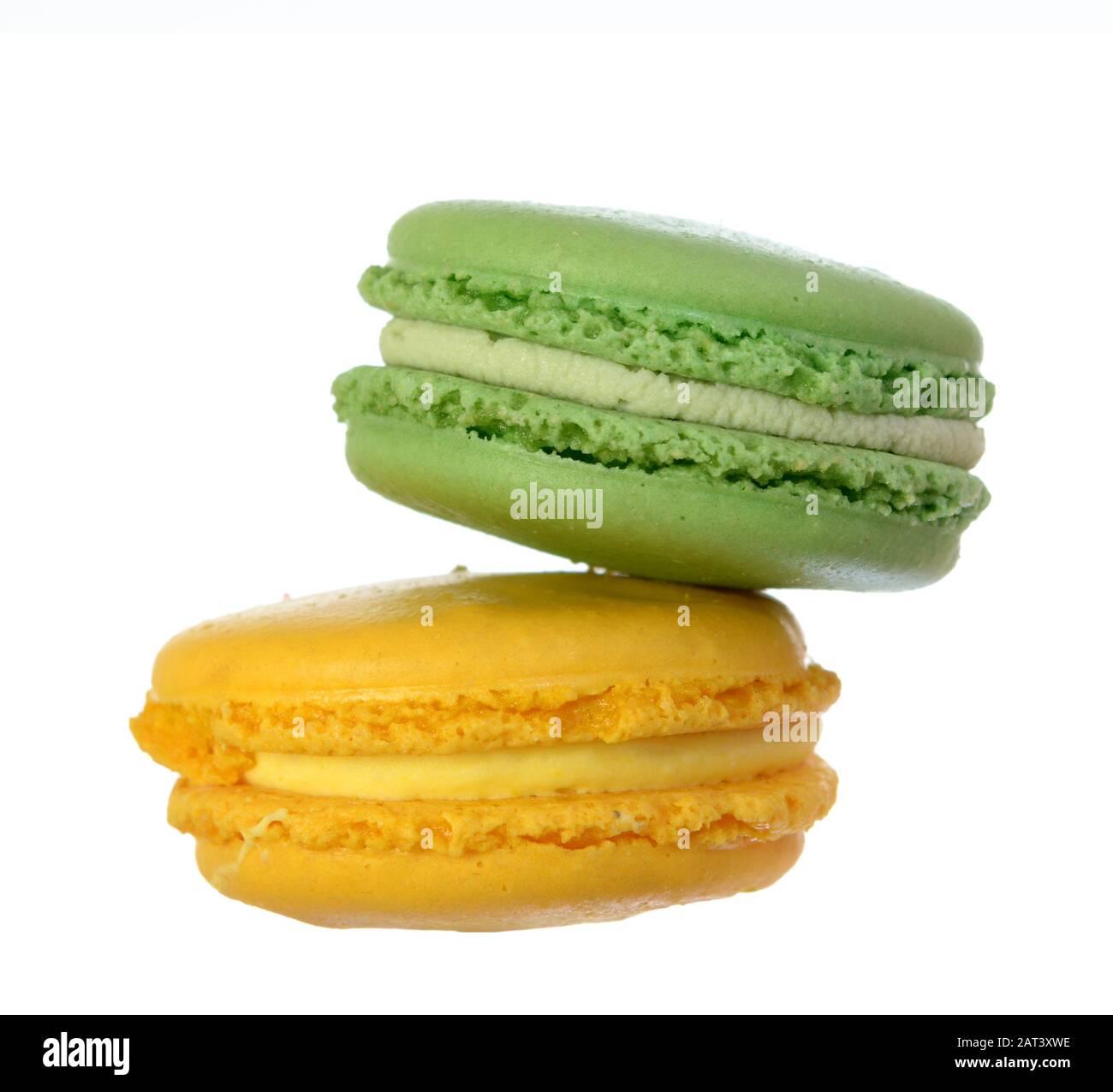 Pitaschio and lemon Macaroon cake isolated on white background Stock Photo