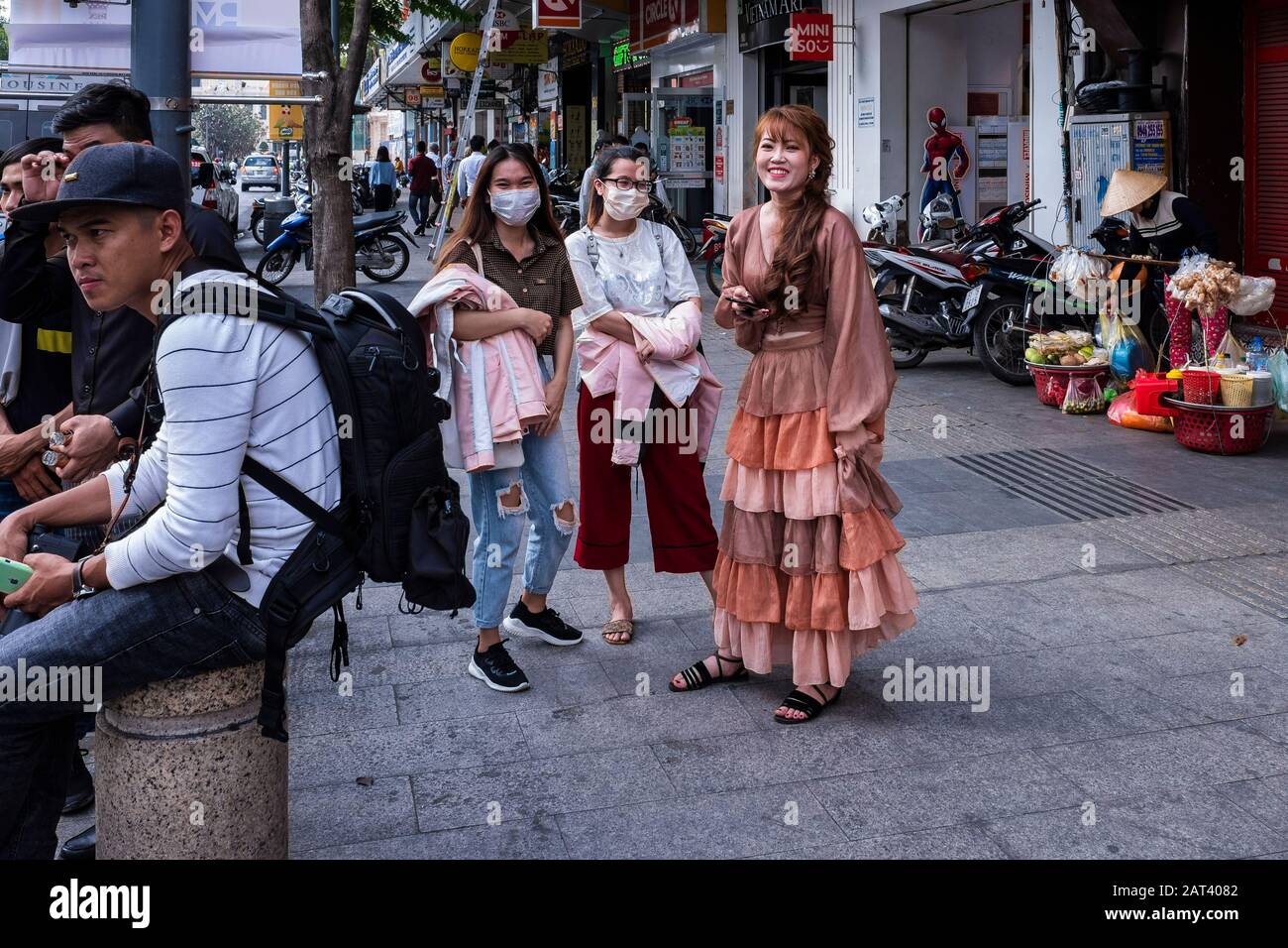 Group of young people on the street, Ho Chi Minh City, Vietnam Stock Photo