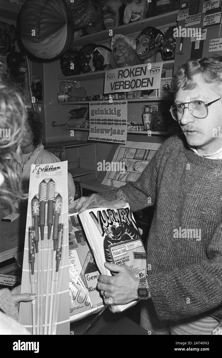 New Year's Celebration in Amsterdam  Various types of fireworks are sold in a shop of party goods Date: 27 December 1985 Location: Amsterdam, Noord-Holland Keywords: New Year's, New Year, New Year sellers, fireworks, shops Stock Photo