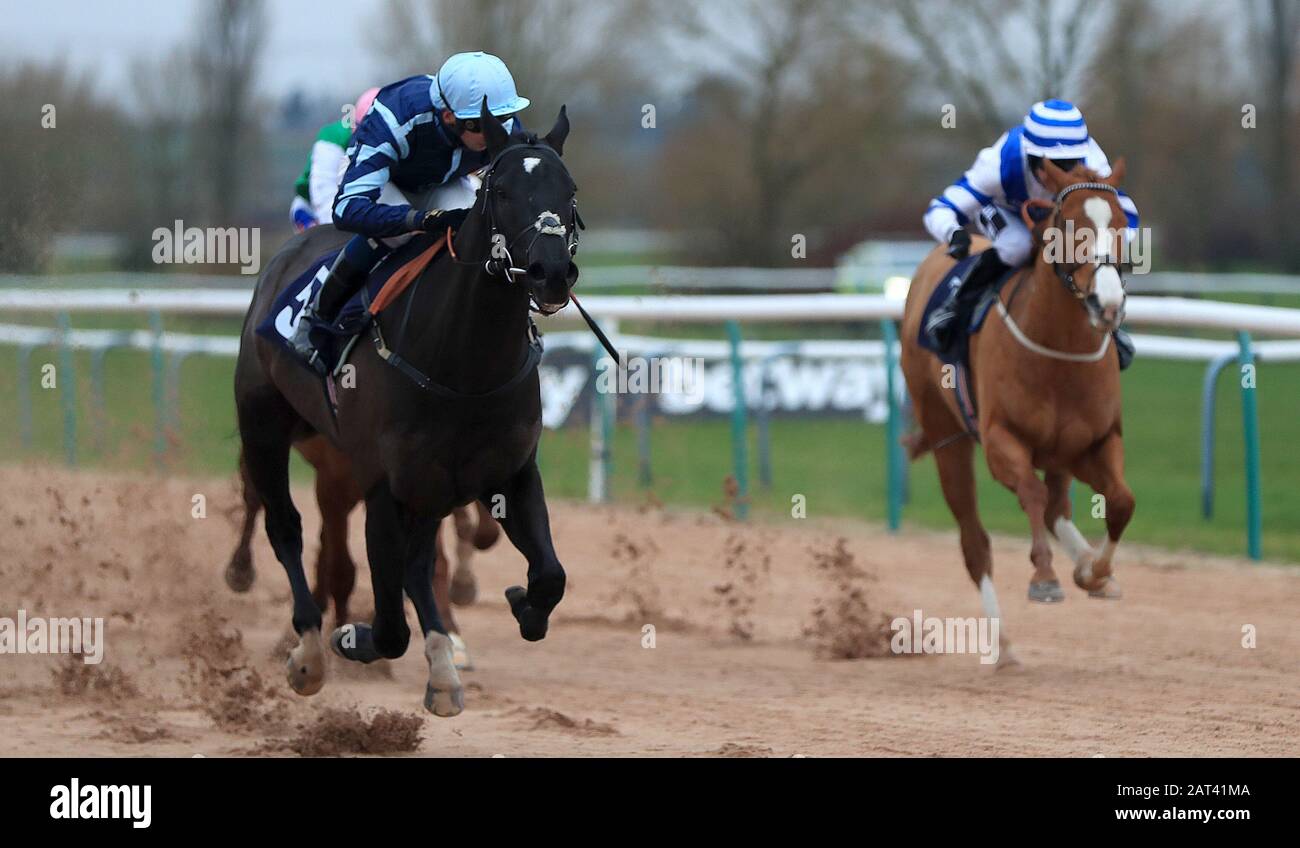 Triple Spear ridden by Alistair Rawlinson wins The Ladbrokes Home Of The Odds Boost Handicap at Southwell Racecourse. Stock Photo