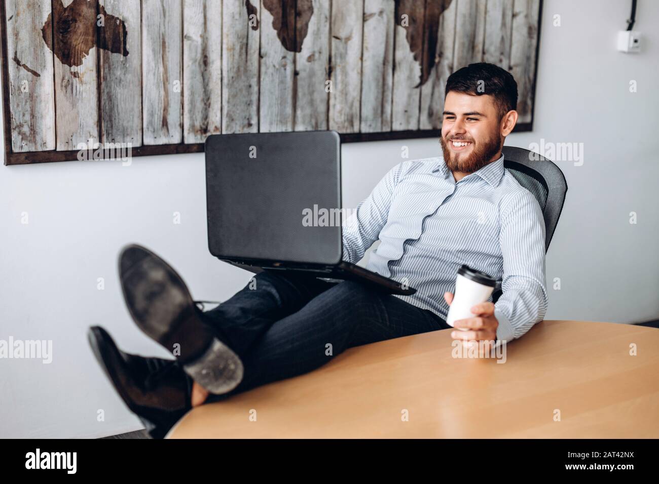 Rest your feet with a nice beer or a coffee hires stock photography