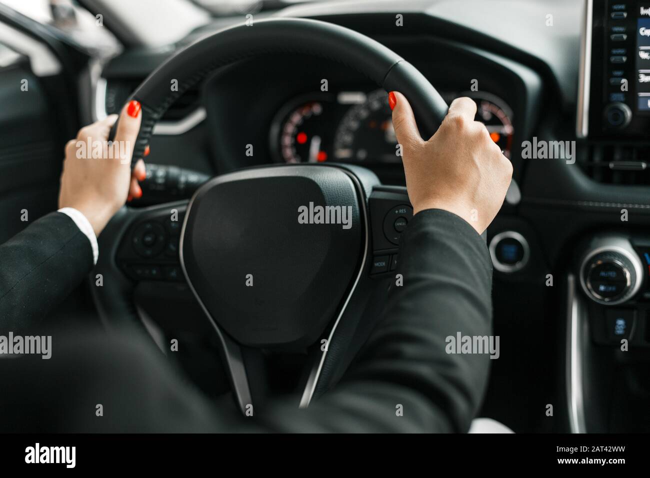 Female hands on steering wheel hi-res stock photography and images - Alamy