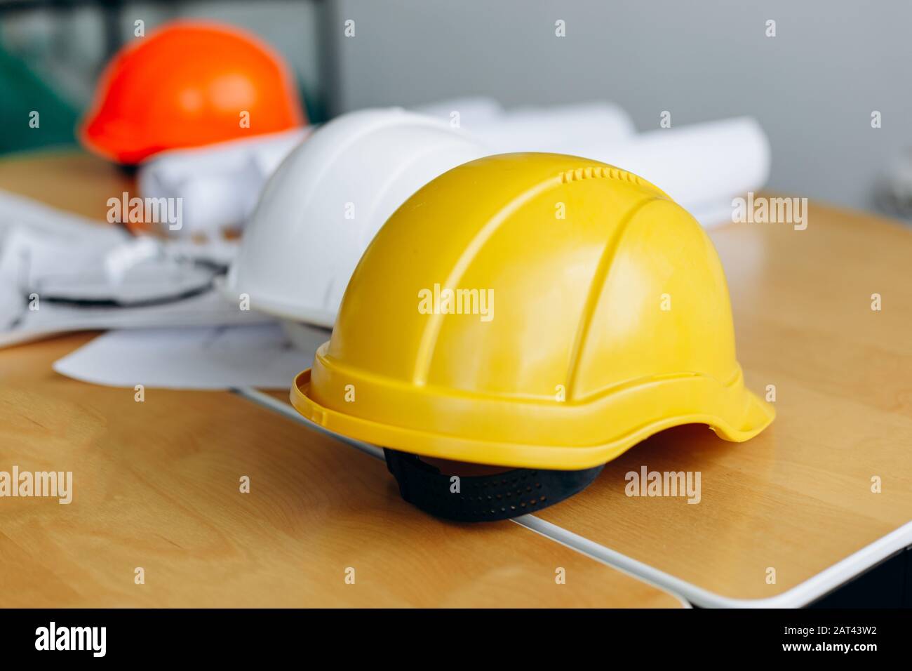 Construction level helmet rolled hi-res stock photography and images ...