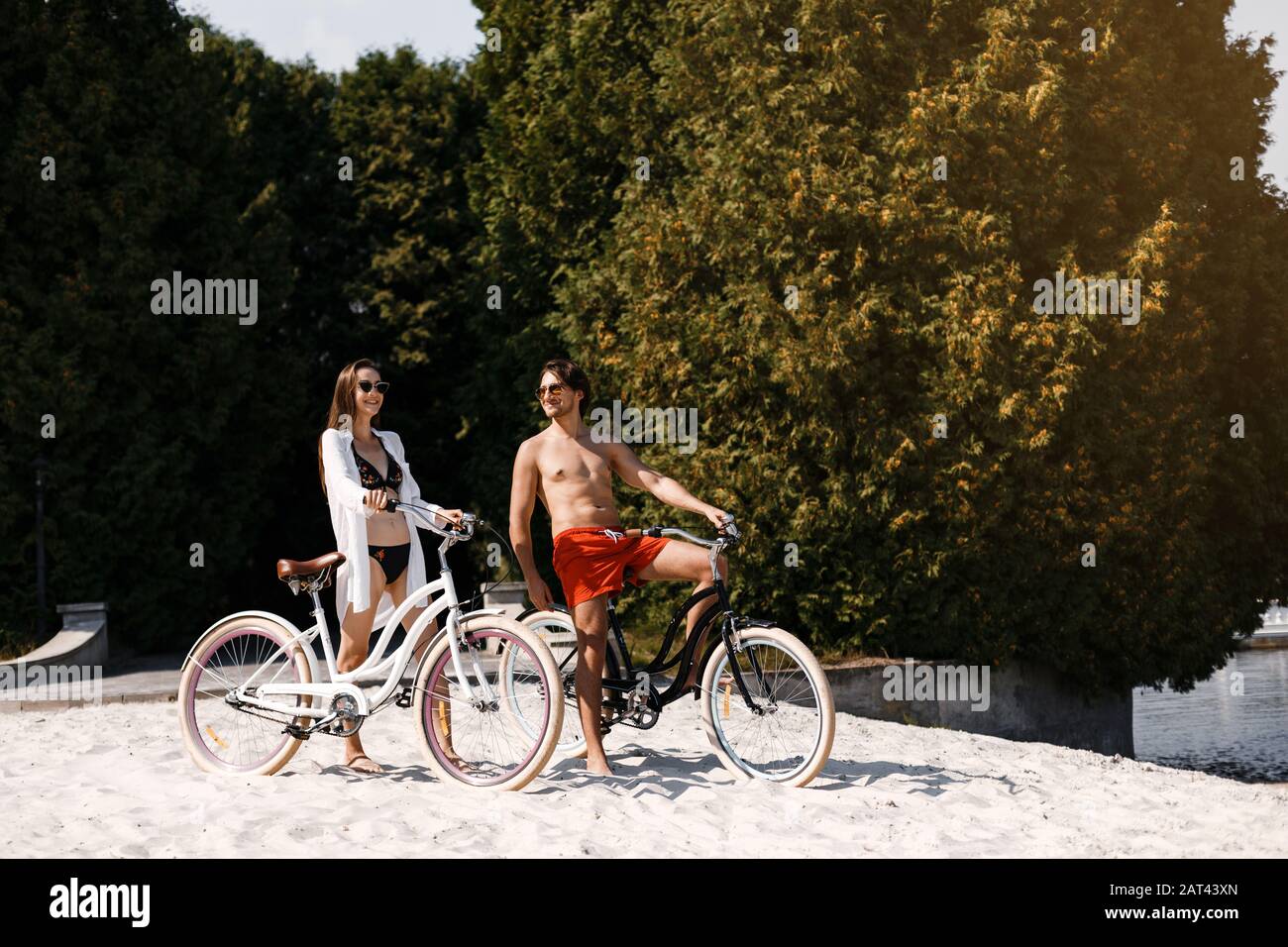 beach riding a tandem bike Stock Photo 