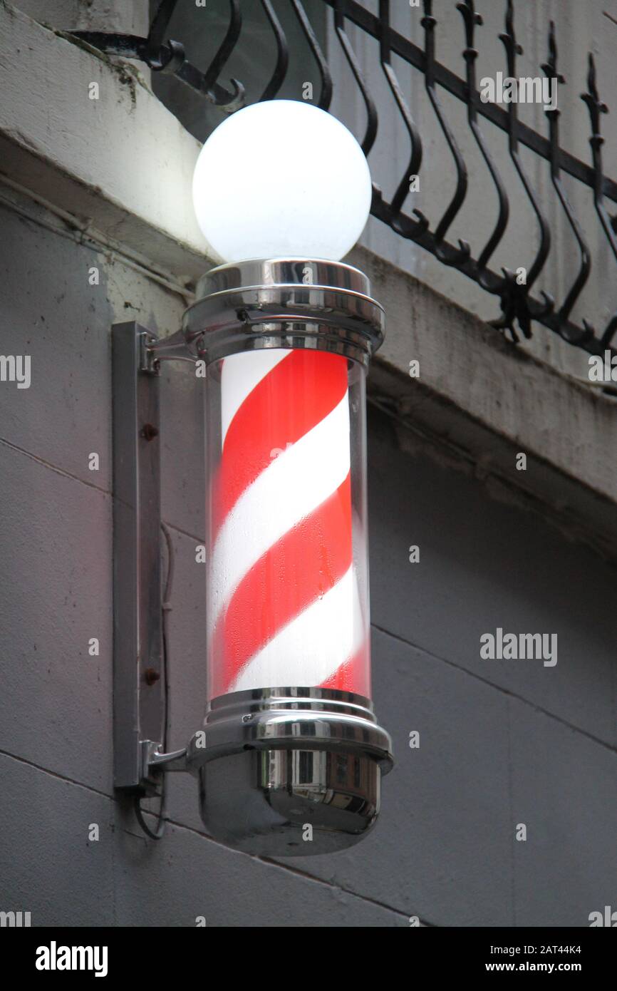 a-traditional-red-and-white-mens-barber-shop-sign-stock-photo-alamy