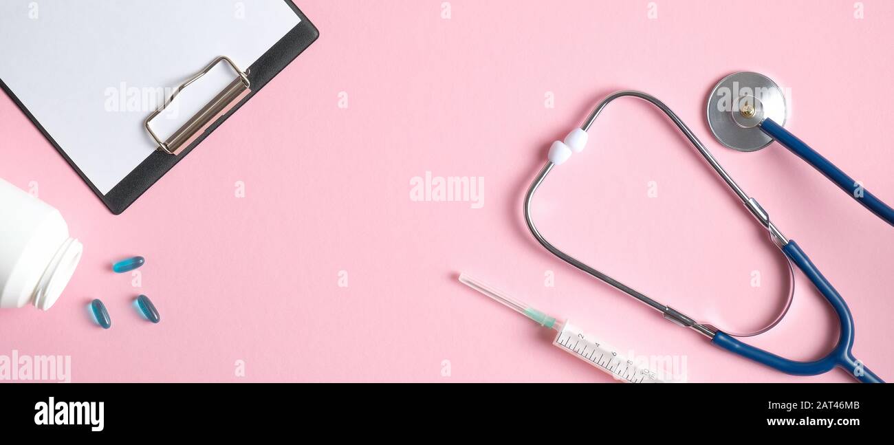 Medical equipment and instruments on pink background. Frame of medical ...