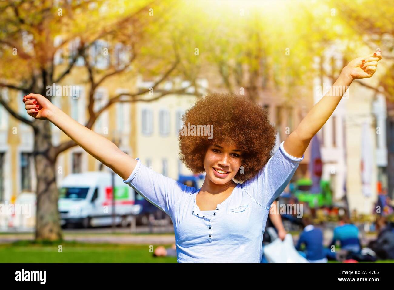 Happy girl in spring sun Stock Photo