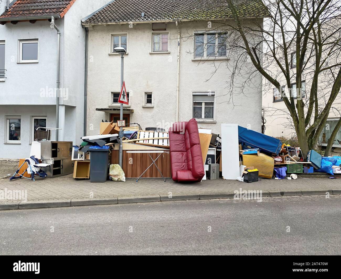 Bulk rubbish on a house Stock Photo
