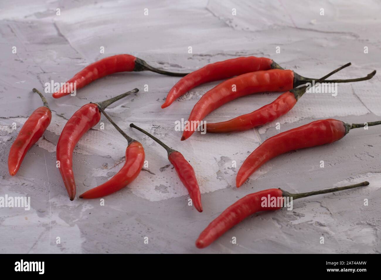 Lots of chilli peppers hi-res stock photography and images - Alamy