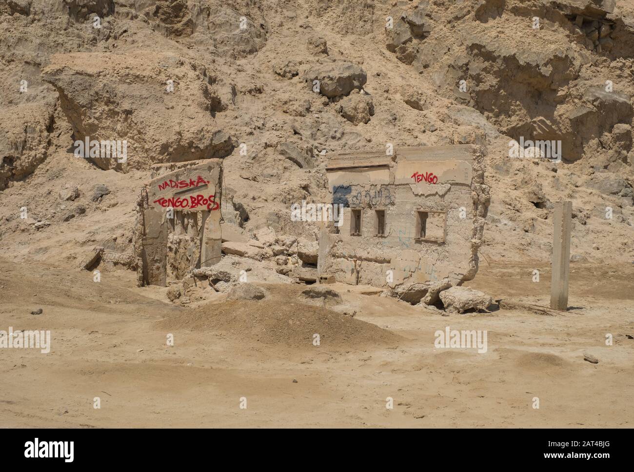 Derelict building and graffiti below Lot's Wife, Mount Sodom near the Dead Sea, Israel Stock Photo