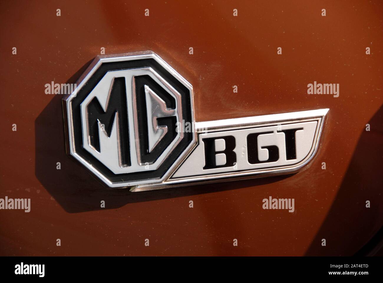 Sign on rear of MGB GT sports car in russet brown color Stock Photo