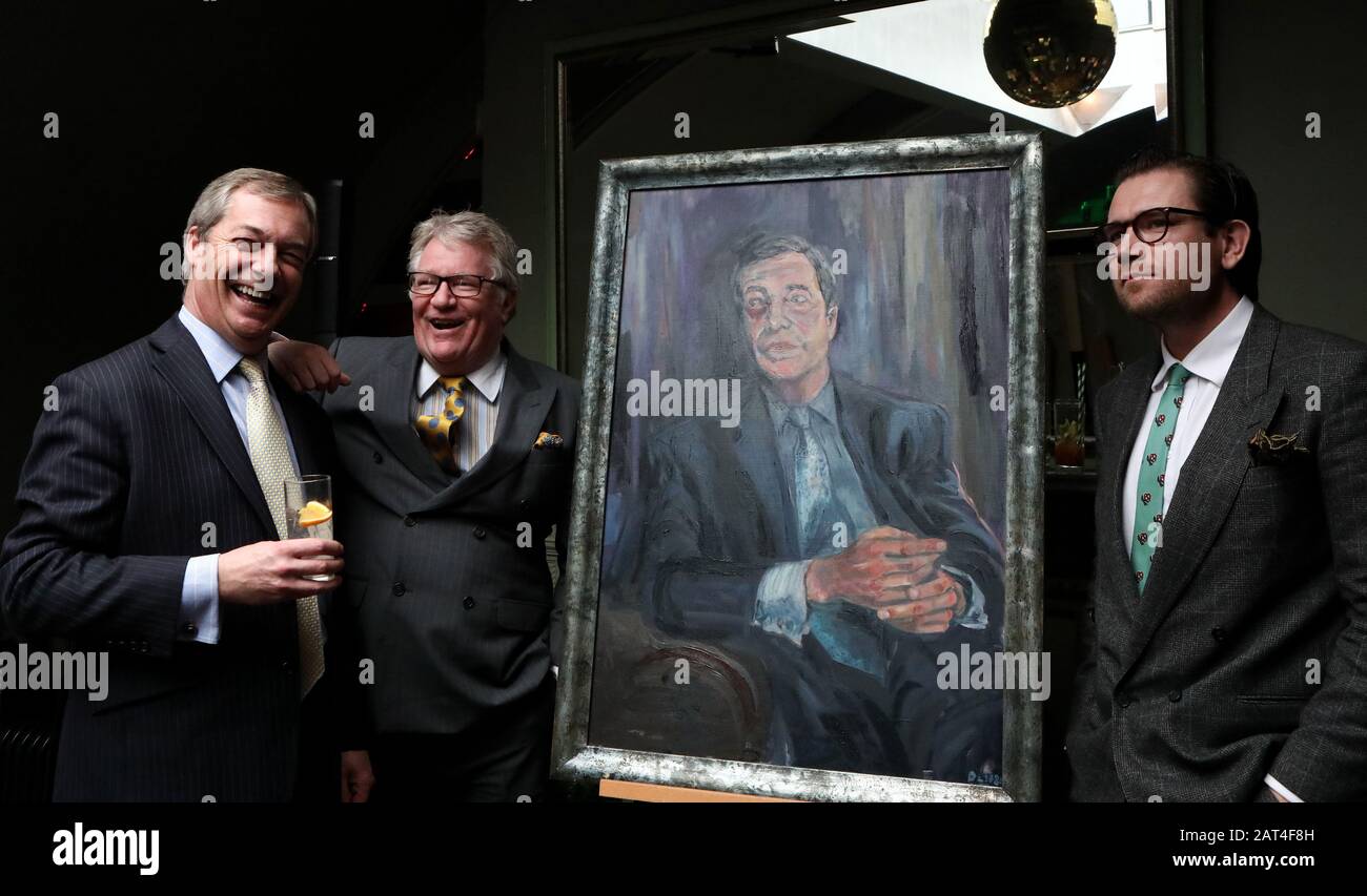 left to right) Nigel Farage, comedian Jim Davidson and artist Dan 