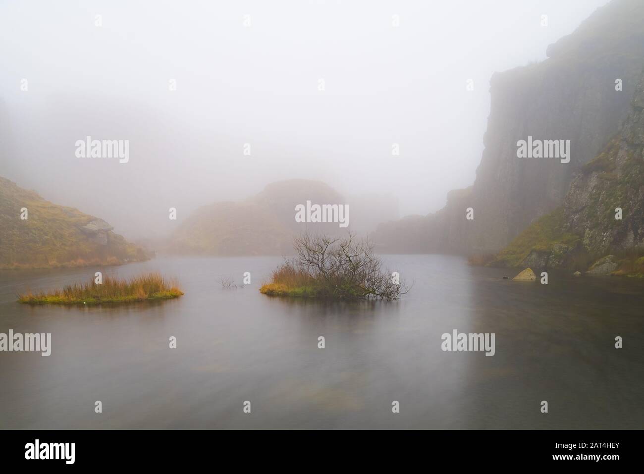 Foggintor quarry in the mist. Stock Photo