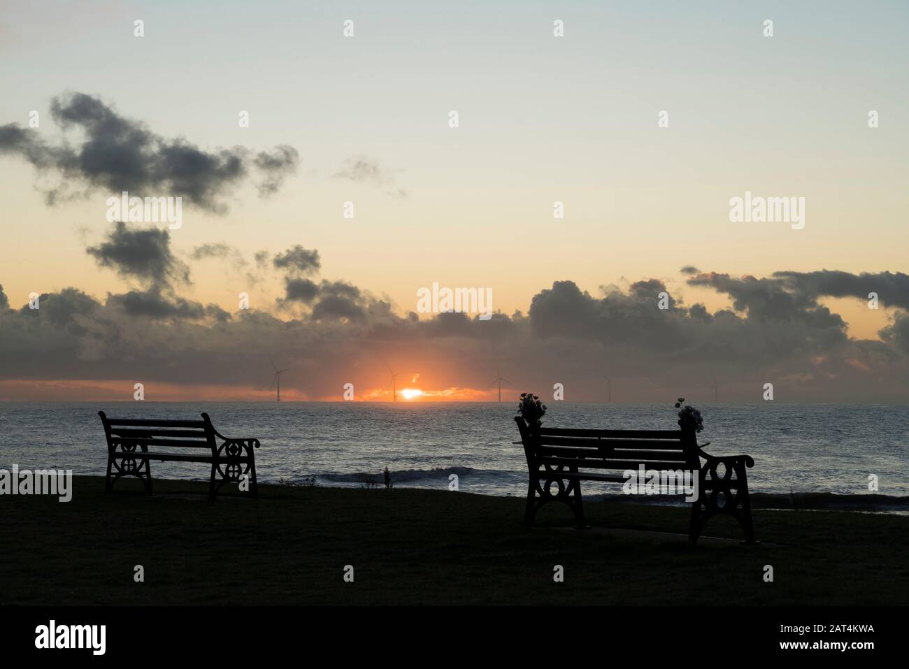 Newbiggin-by-the-sea benches at dawn, Northumberland. Stock Photo