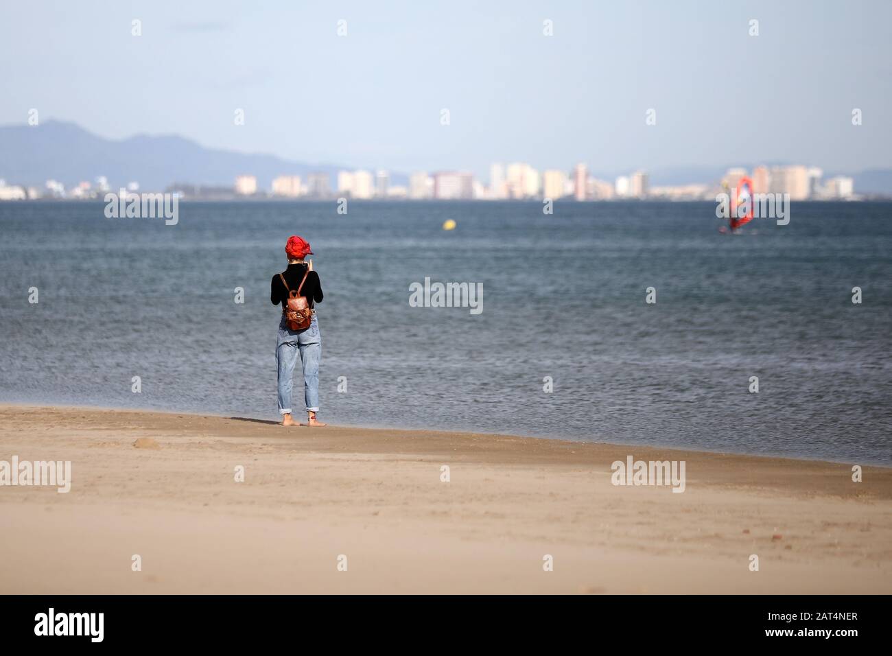 Girl looks at the sea in Valencia. Stock Photo