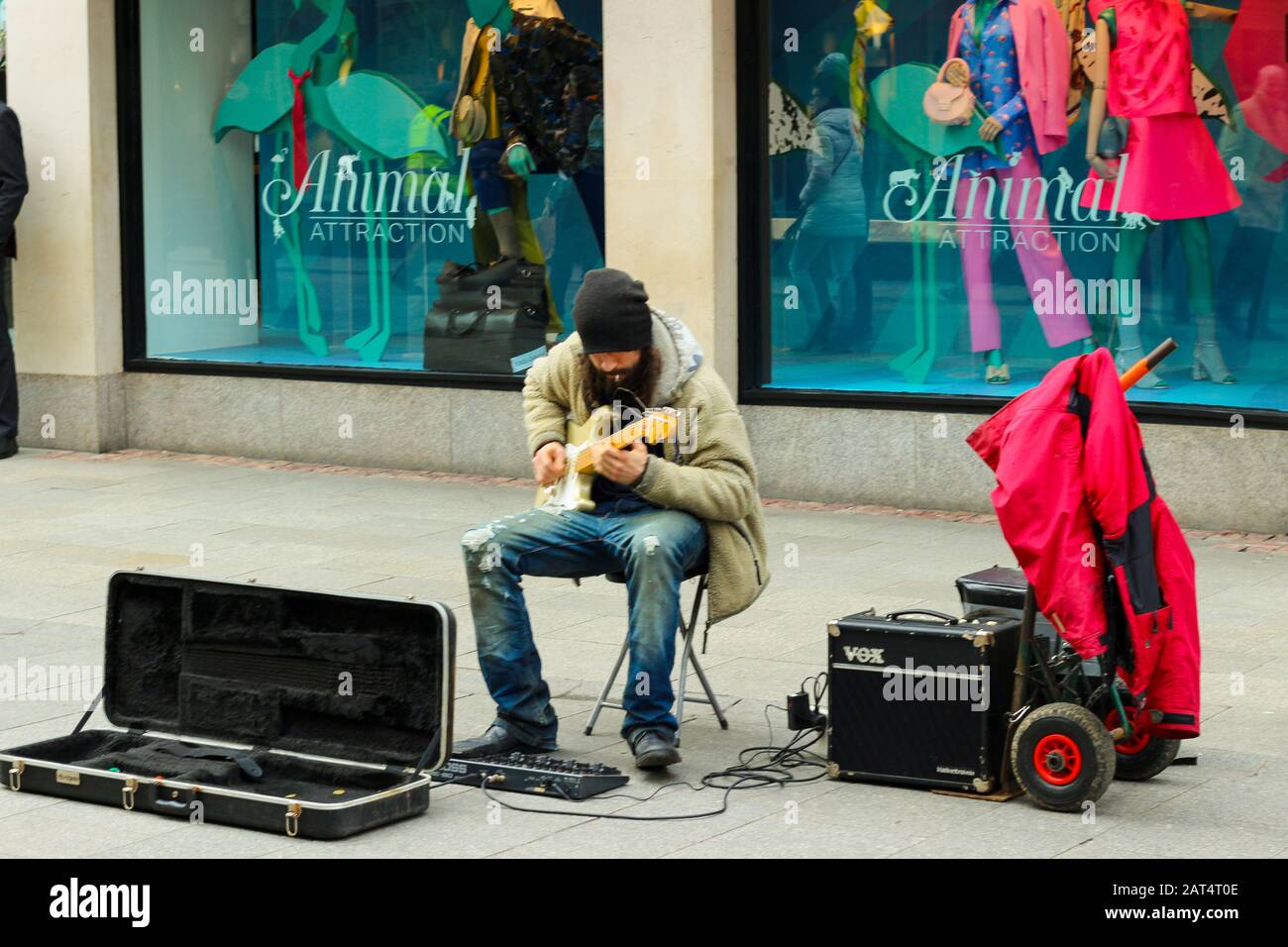 DUBLIN IRELAND, February 19 2018: Editorial photo of a man playing guitar in Dublin Ireland Stock Photo