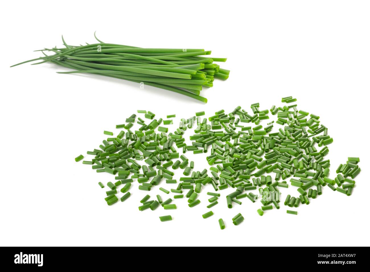 Chives bunch and chopped chives  isolated on white background Stock Photo