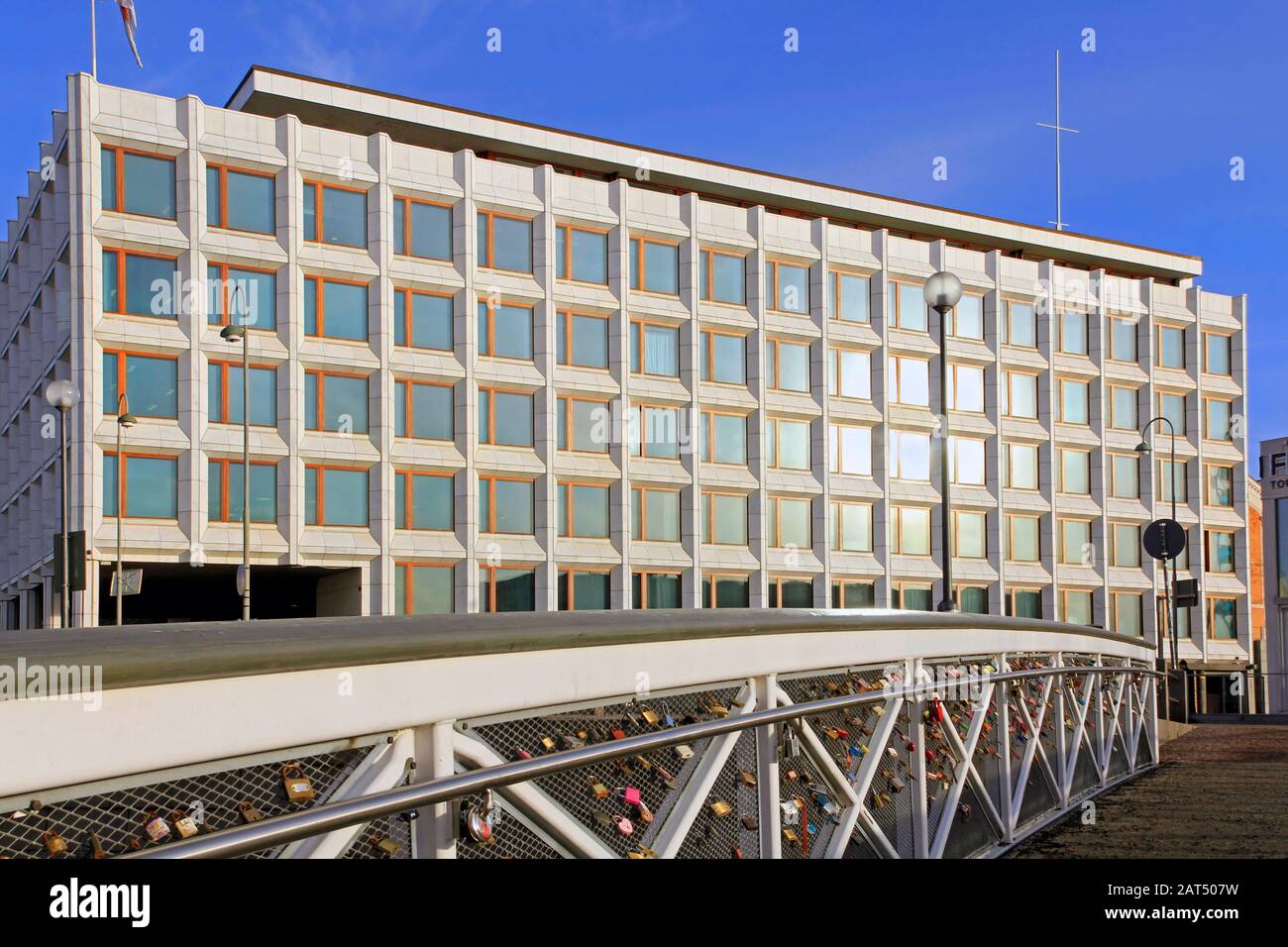 Enso-Gutzeit, now Stora Enso, Headquarters seen from pedestrian bridge with love locks. Design by Alvar Aalto. 1962. Katajanokka, Helsinki, Finland. Stock Photo