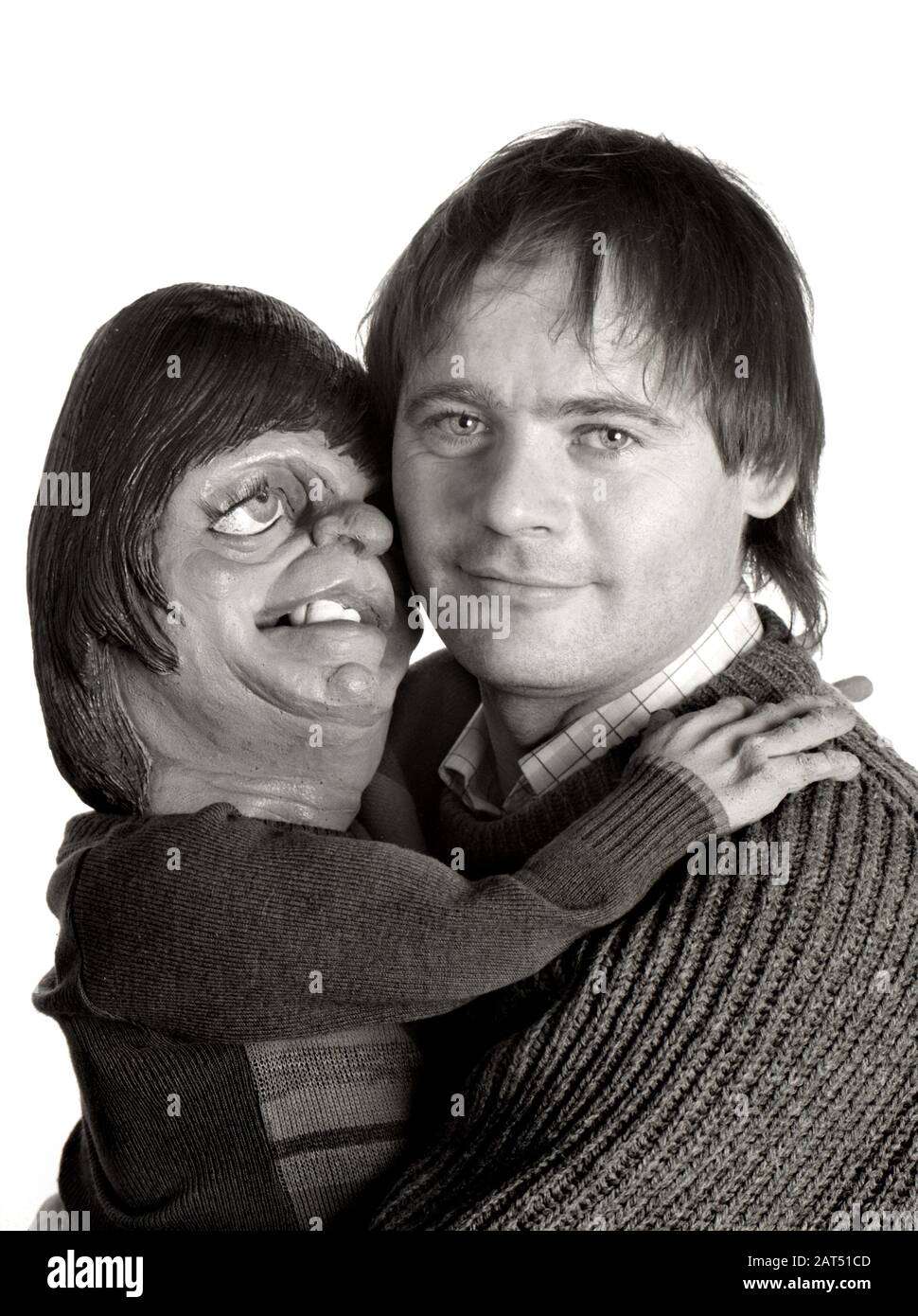 John Lloyd - Comedy Writer & Producer. Portrait taken in 1988 showing him with his Spitting Image puppet. Stock Photo