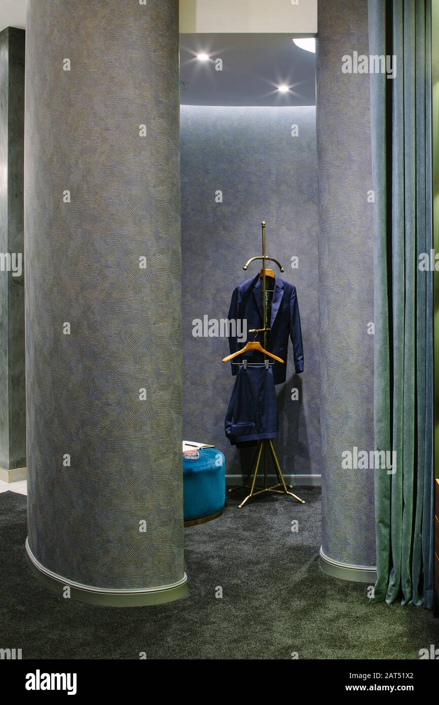 Curved partitioning for the fitting room. Thaddeus Tailor, Johannesburg